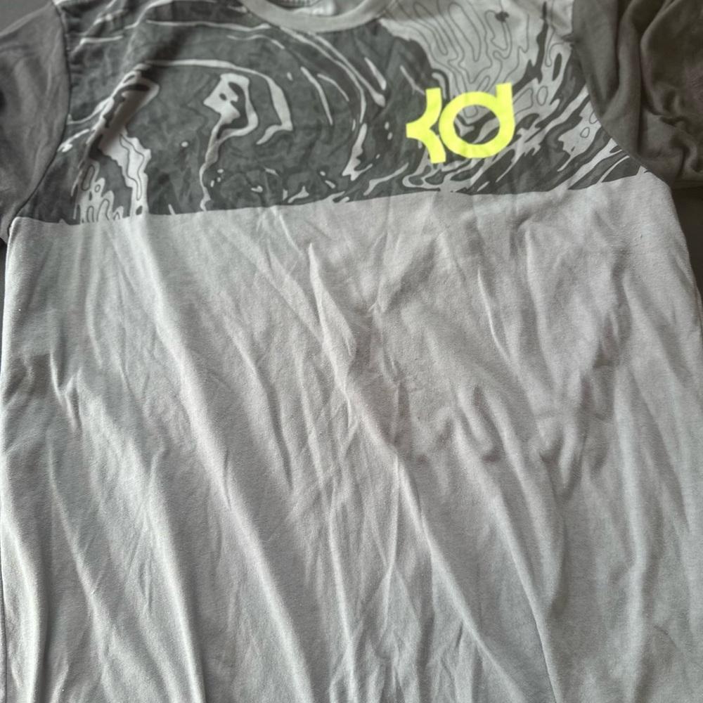 Gray and Black Graphic T-Shirt with Yellow Logo